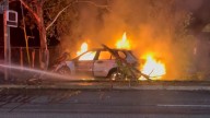 Army football player rushes to pull man from burning car