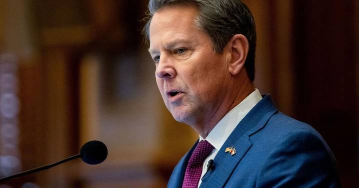 Georgia Gov. Brian Kemp swears in his daughter as a state trooper