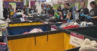Donated clothes become care packages for Philadelphians in need at the Giving Factory. Take a look inside