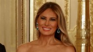Melania Trump makes a statement in unusual colour clash gown for state banquet