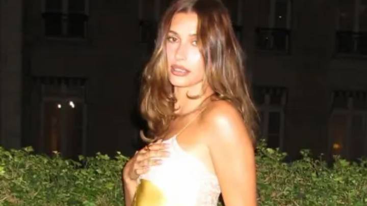 Hailey Bieber sizzles in silky lingerie and knee high boots at Paris Fashion week