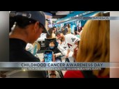 Kids from Phoenix Children's Hospital decorate cleats