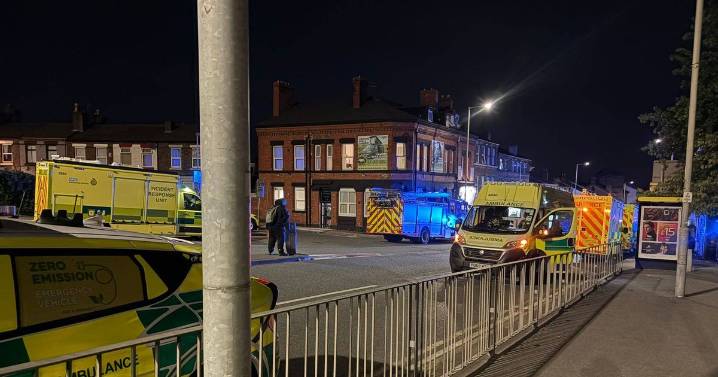 Person rushed to hospital after falling nearly 100 feet down embankment in Liverpool