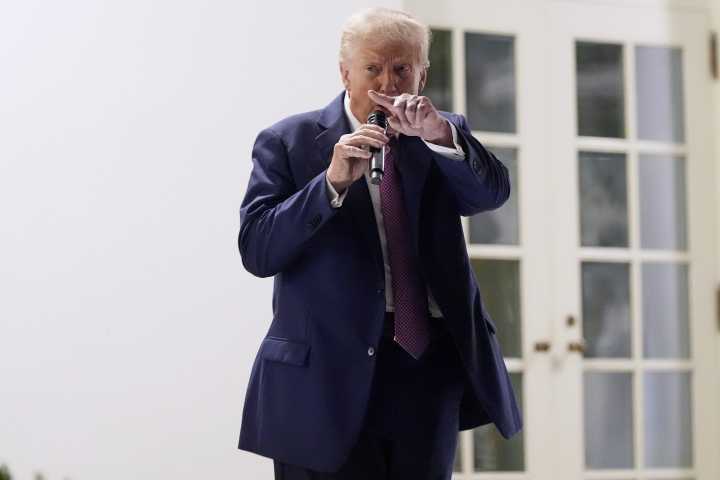 Trump threatens Chicago with apocalyptic force and Pritzker calls him a 'wannabe dictator'