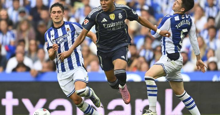 Mbappé leads 10-man Real Madrid to win at Sociedad after Huijsen sees red card