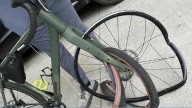 Cyclist survives crash after split