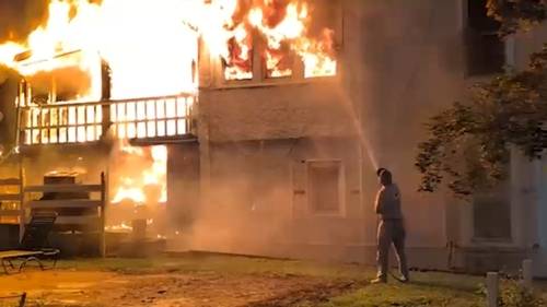 Mount Vernon police officers rescue 3-year-old child, 4 others from window of burning home