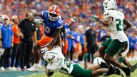 Florida football coach Billy Napier speaks after the Gators' loss to USF