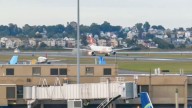 Flames shoot from Swiss Air engine during Boston Logan takeoff attempt