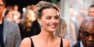 Margot Robbie Wears Leg-Baring Gown and Little Black Dress in NYC