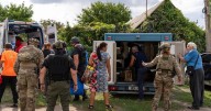 "Brutally savage" Russian strike kills at least 20 in east Ukraine as pensions were handed out, Zelenskyy says