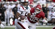 Dual threat QB Green, Arkansas pile on Arkansas State 56