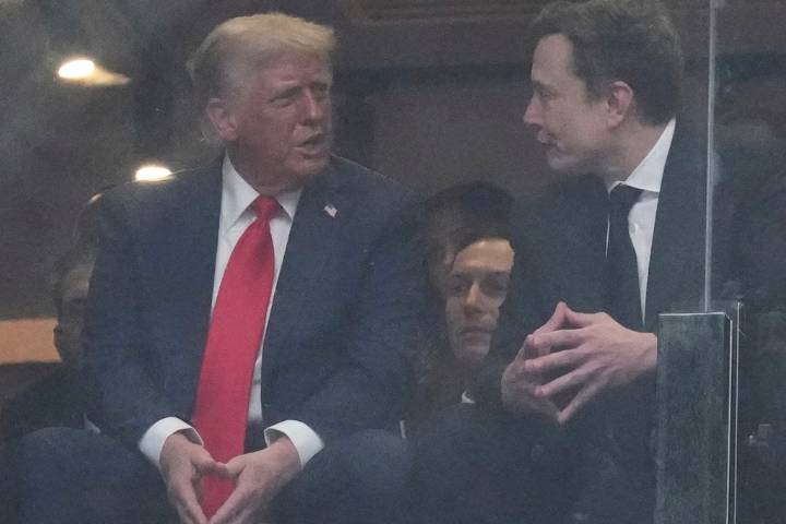 Trump and Musk shake hands during Charlie Kirk's memorial in Arizona