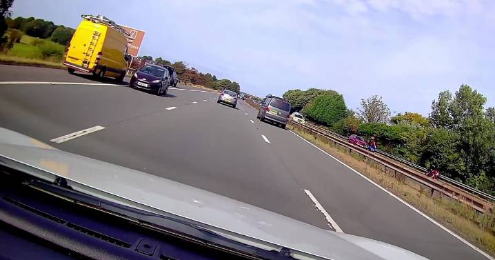 Hair-raising moment Ford Fiesta drives wrong way down busy motorway
