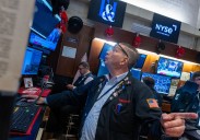Wall Street inches higher ahead of revisions to U.S. jobs numbers