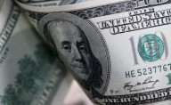 Dollar drifts as investors await US labour market indicators