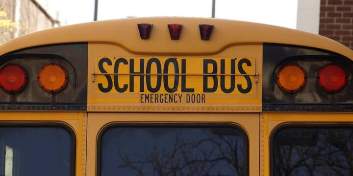 One injured in two-vehicle crash involving school bus, dispatchers say