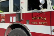 Peoria apartment fire causes $100K damage and sends a firefighter to the hospital