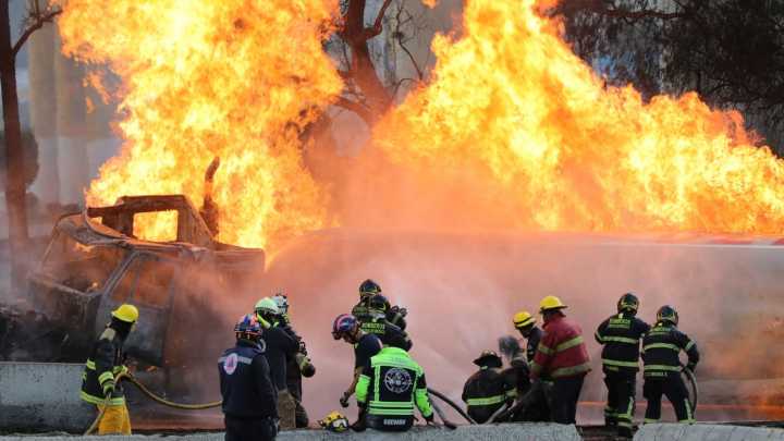 Terrifying moment crowds run for their lives as gas tanker EXPLODES leaving at least three dead in Mexico