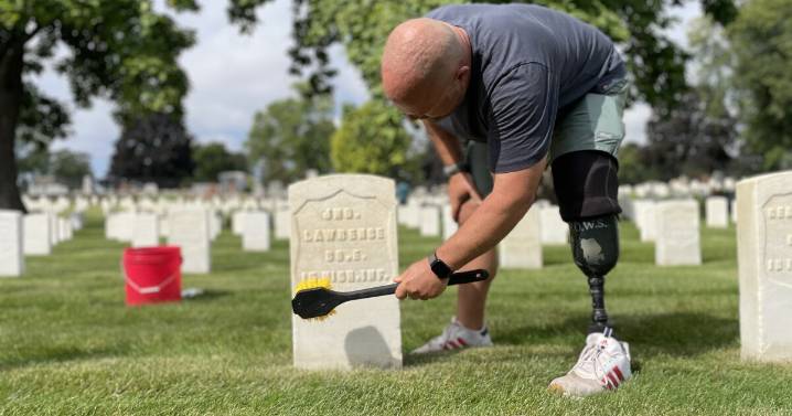 Volunteers honor fallen veterans at Wood National Cemetery on September 11