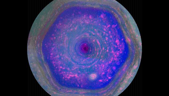JWST Spots "Unexplained" Strange Dark Beads Above Swirling Hexagon Storm At Saturn's North Pole