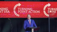 Pastor Rob McCoy opened the Charlie Kirk memorial as 'Charlie's Pastor'