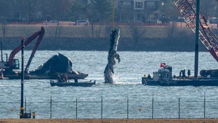 Family of 1 of the 67 Washington plane crash victims sues the FAA, Army and American Airlines