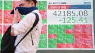 Asian benchmarks slip after US stocks sink and Japan faces political uncertainty