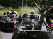 El régimen de Nicolás Maduro busca mostrarse invencible frente a la "amenaza" de Estados Unidos, pero para muchos la realidad es otra