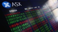 Mining stocks lead market higher as gold resets record
