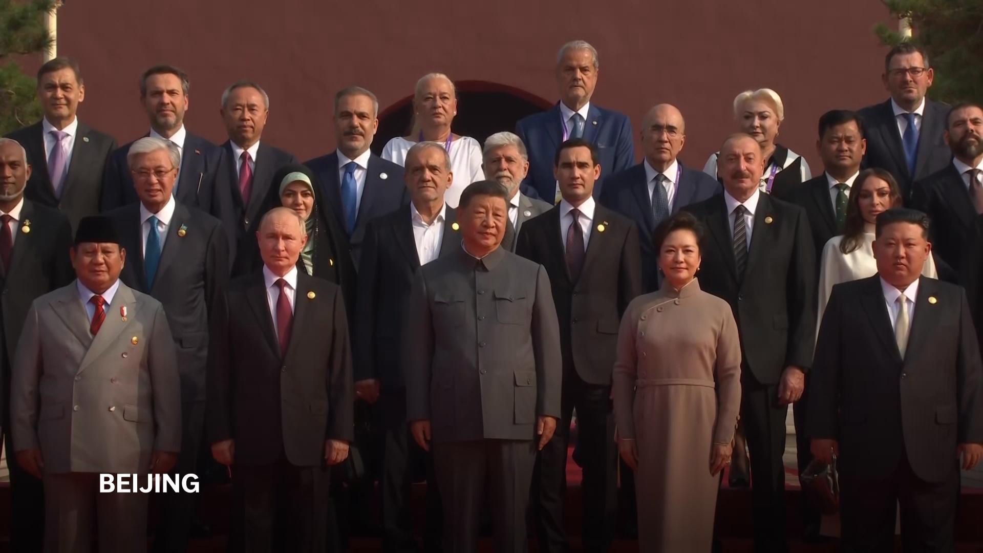 Xi poses for photo along with Kim, Putin and other leaders ahead of China military parade