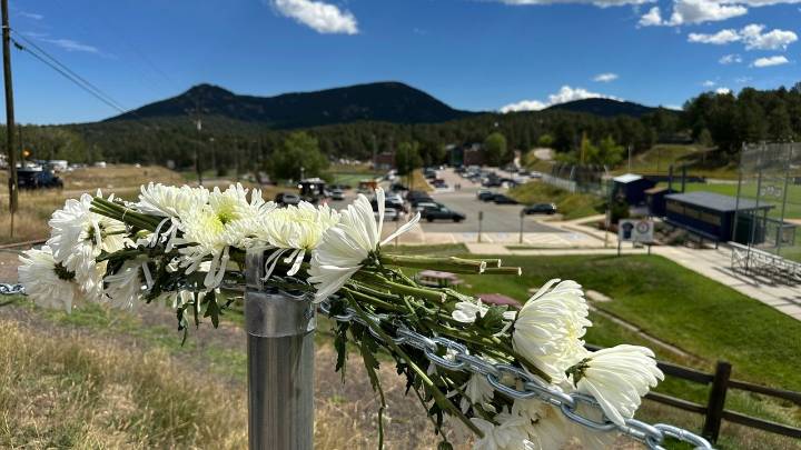 Authorities say student who had been radicalized fired revolver at Colorado school, wounding 2
