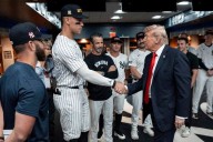 Trump draws cheers and boos while marking 9/11 by attending a New York Yankees game