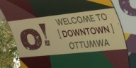 Main Street America tours downtown Ottumwa evaluating community development