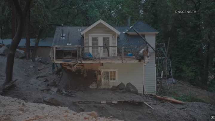 Mudslides damage homes, bury roads and cars in Southern California