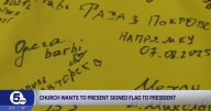 Local church presents Ukraine flag with soldier signatures to Trump