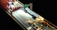 Overturned tractor-trailer shuts down 62nd Street Bridge