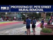 Community uses chalk art to protest FDOT removing street murals