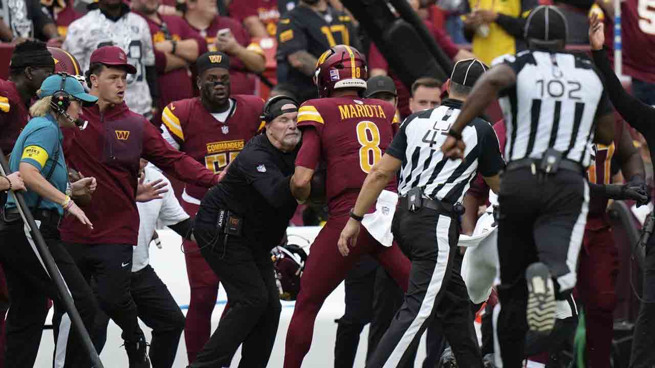 Commanders coach Dan Quinn bloodied in sideline collision with Marcus Mariota