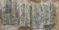 Tasmania news: Man arrested after $1 million in cash found hidden in cardboard box in car