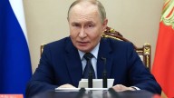 Putin says Russia is willing to abide by nuclear arms deal with the US for 1 year after it expires