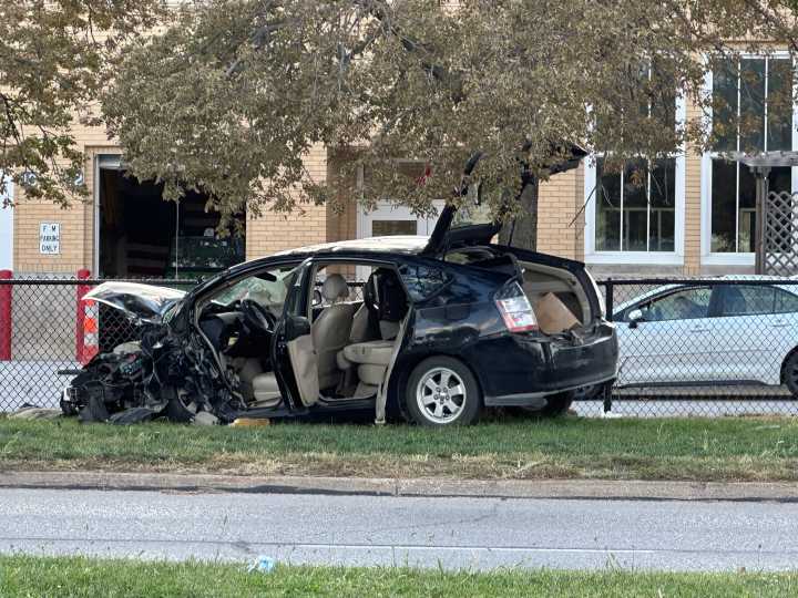 One hospitalized after car goes off road near Lincoln High