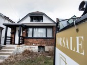 Toronto home prices and sales dip as listing jump almost 4%