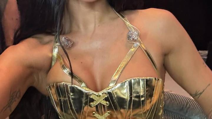 Guess The Golden Singer In This Sexy Corset!