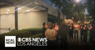 Downey residents hold vigil after deadly stabbing outside public library