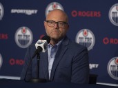 German Center Josh Samanski shoots his shot with the Edmonton Oilers