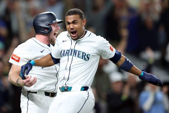 Mariners come back late to clinch AL postseason berth; eye AL West title