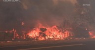 Eye Opener: Wildfires burn out of control in California