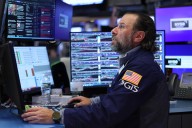 Stocks tick lower as government shutdown looms