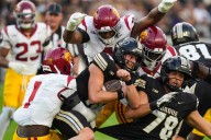 USC overcomes 3-hour delay and slow start to hold off Purdue for 33